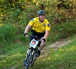 Photo of a man on a mountain racing bike